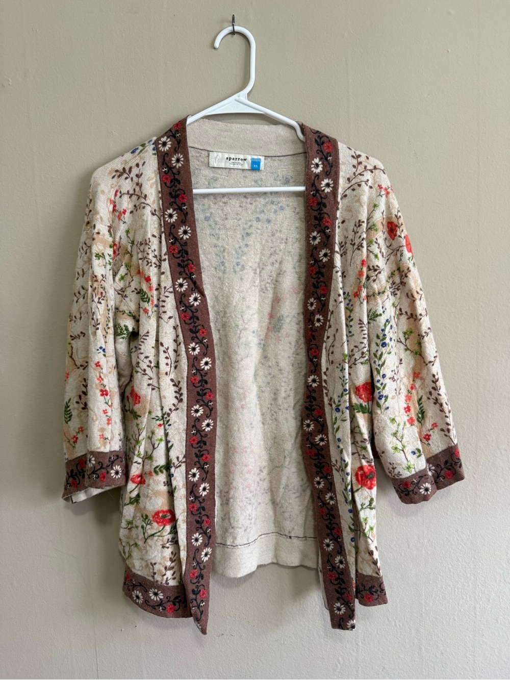 Sparrow Cream Open Cardigan with Floral Embroidery and Brown Trim